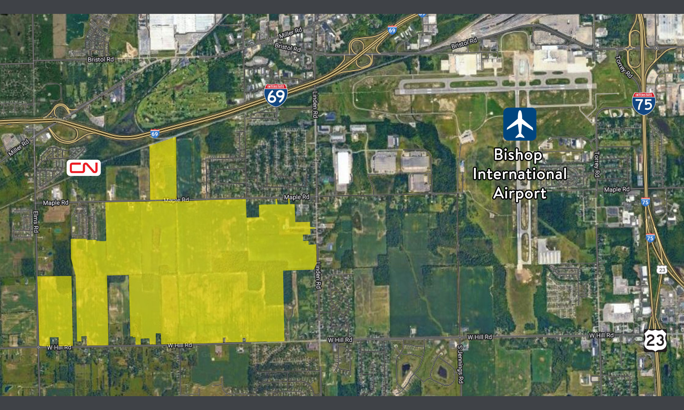 Satellite image with the Advanced Manufacturing District of Genesee County, located in Mundy Township highlighted in yellow.